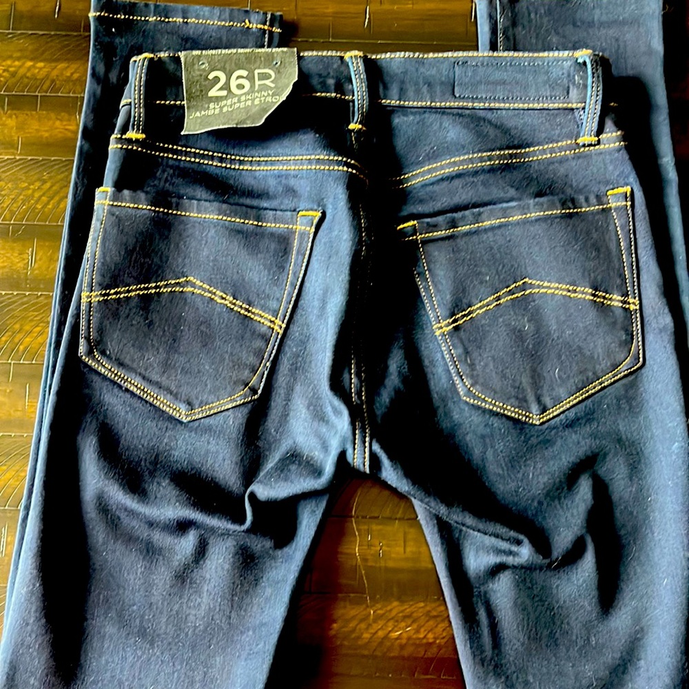 Armani Exchange jeans.
